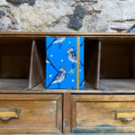 Llibreta. Tela. Estampat ocell fons blau.