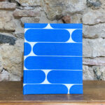 Medium Photo Album. Retro fabric. Blue color. Black sheets.