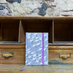 Notebook. Traditional Japanese print Chiyoda cranes light purple background. 