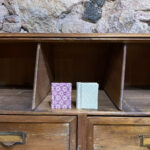 Assorted minibooks (Pack of 2). Purple and green fabric with floral geometric motifs.